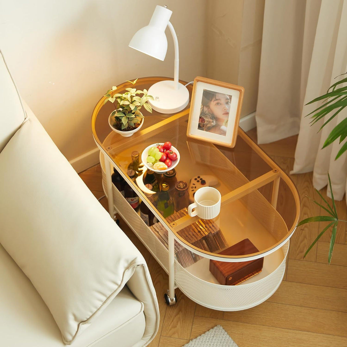 Movable Oval Coffee Table with Tempered Brown Glass and Storage, 35'' x 17'' Stylish Functional Metal & Glass Tea Table for Living Room