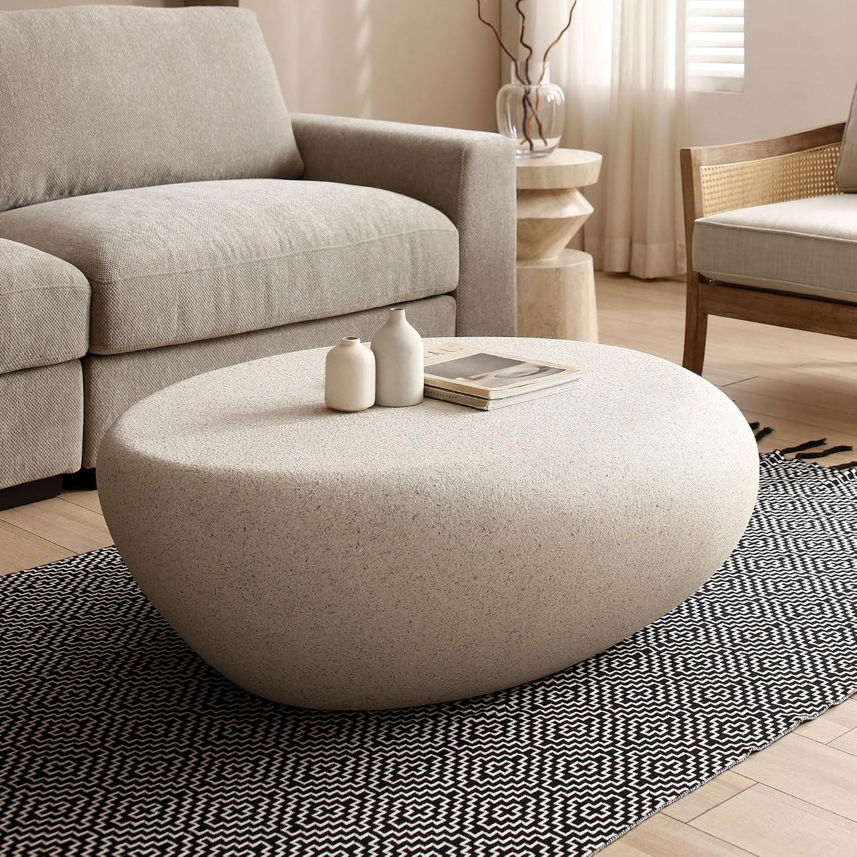 43.31 Modern Faux Stone Coffee Table for Living Room, Contemporary Rustic Style Curved Oval Coffee Table, Fiberglass Material & Grainy Stone Paint, No Assembly, Cream White