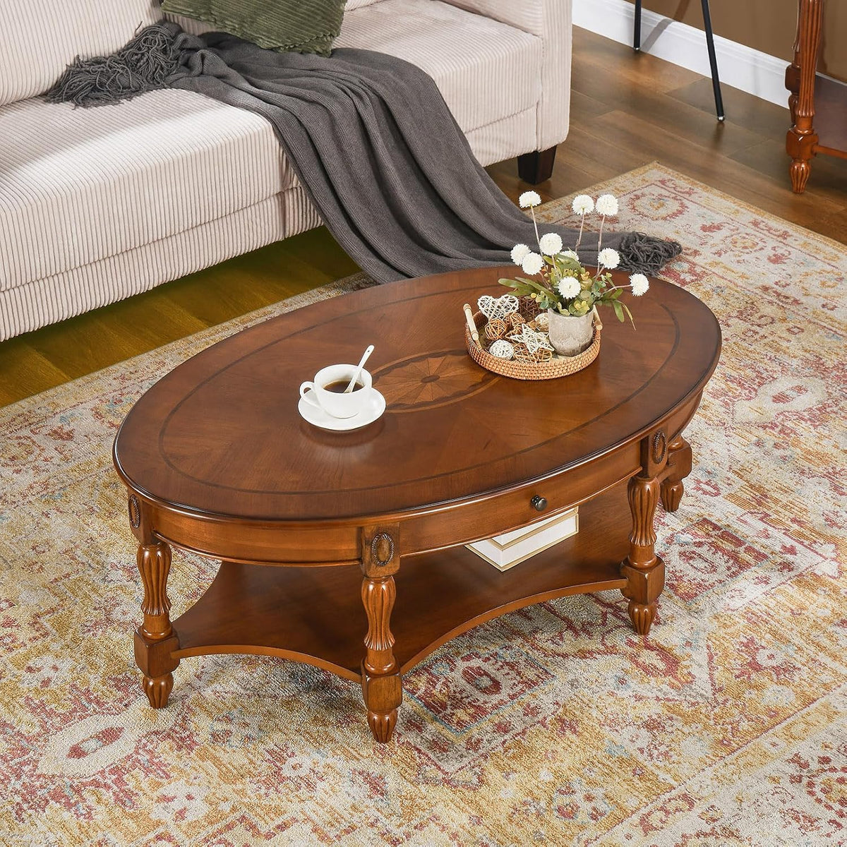 Solid Wood Oval Coffee Table with Drawer, Patterned Top and Vintage Carved Edge, 45' x 18' Center Table in Caramel Brown for Living Room